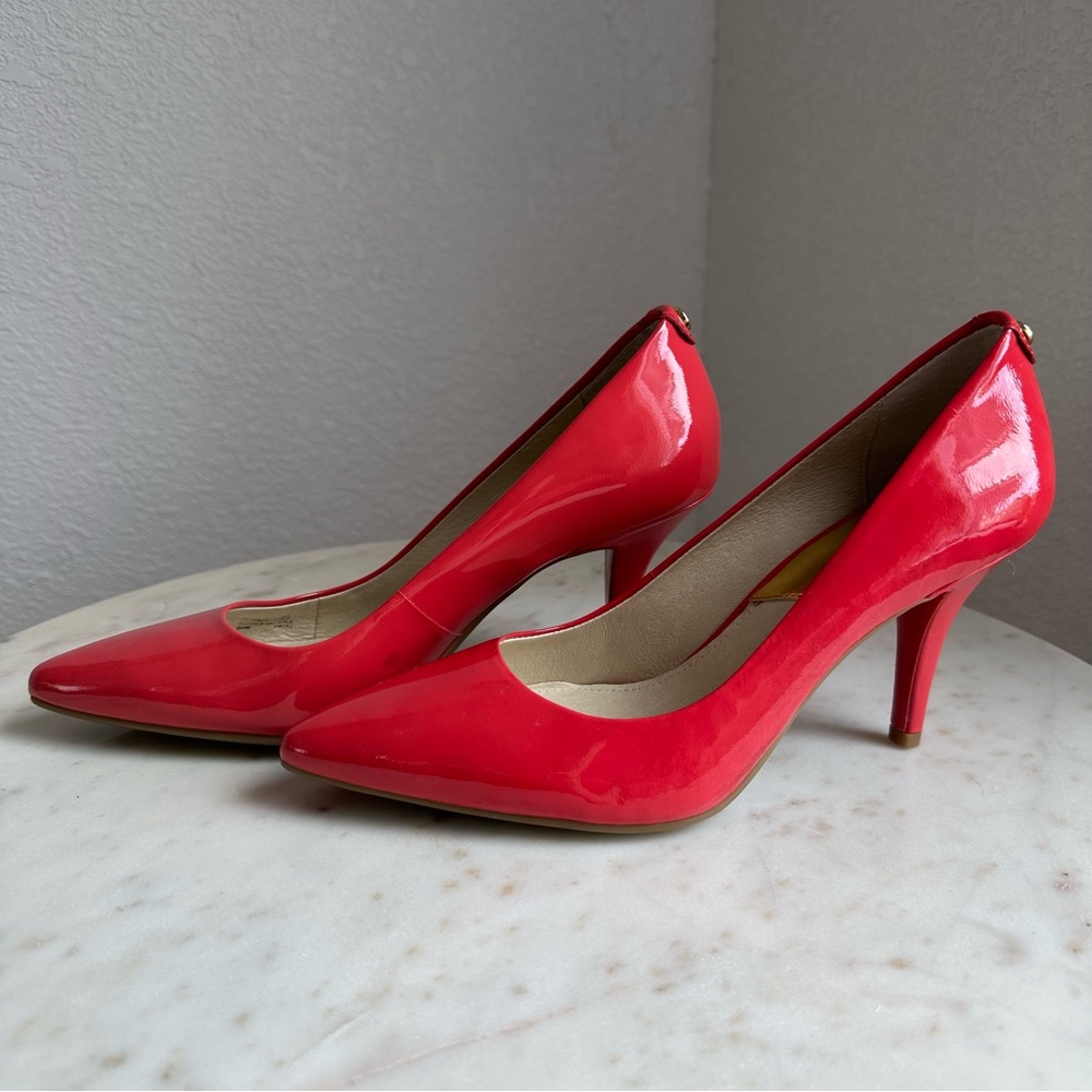 Brand new, unworn Michael Kors Coral Patent Leather pumps, size 6.5